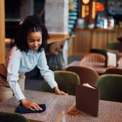 happy-african-american-waitress-cleaning-tables-in-a-cafe-.jpg happy-african-american-waitress-cleaning-tables-in-a-cafe-.jpg